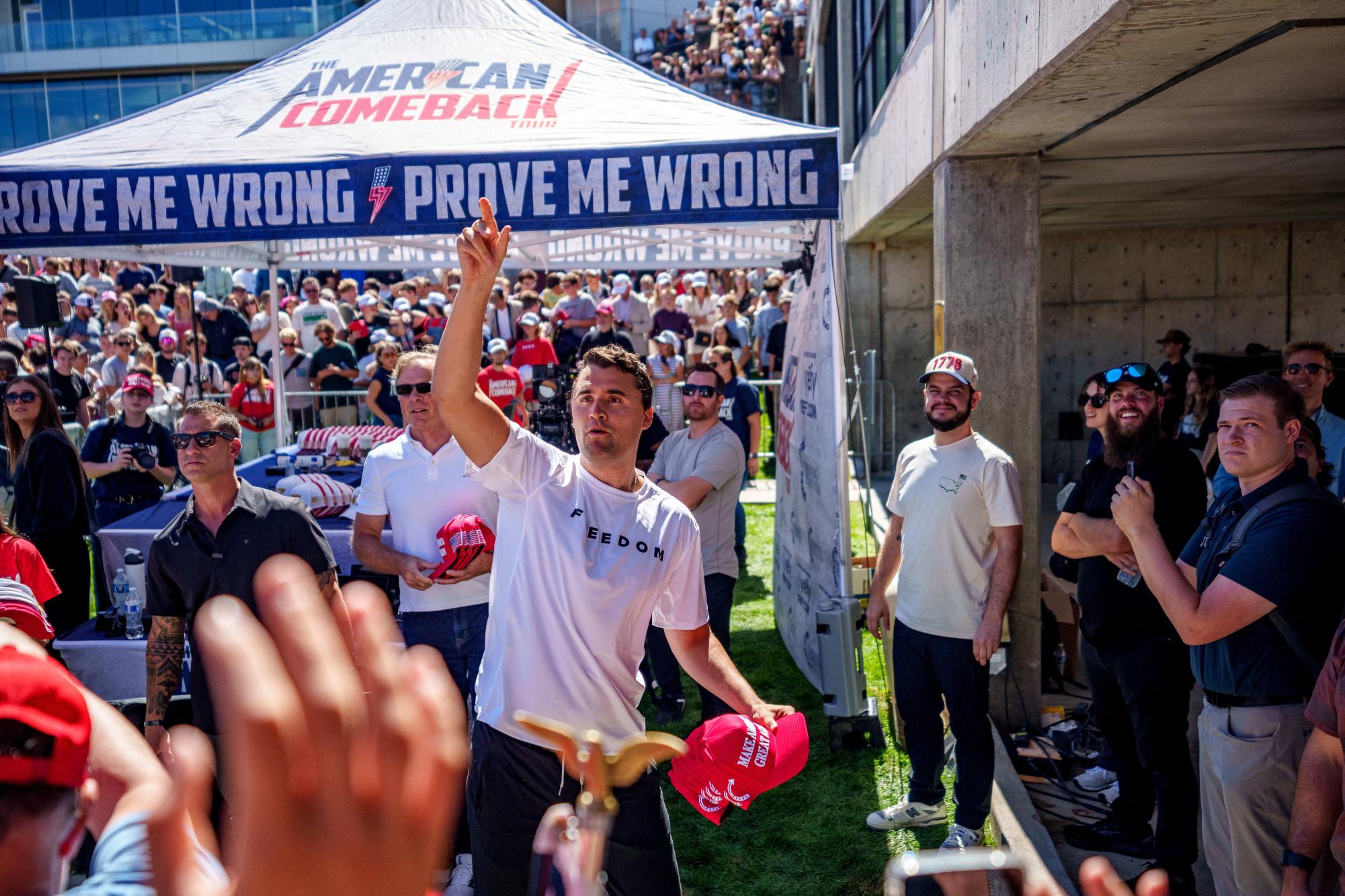 U.S. right-wing activist and commentator Charlie Kirk throws hats to the crowd shortly before he was shot at a Utah Valley University speaking event in Orem, Utah, U.S. September 10, 2025. Trent Nelson/The Salt Lake Tribune via REUTERS