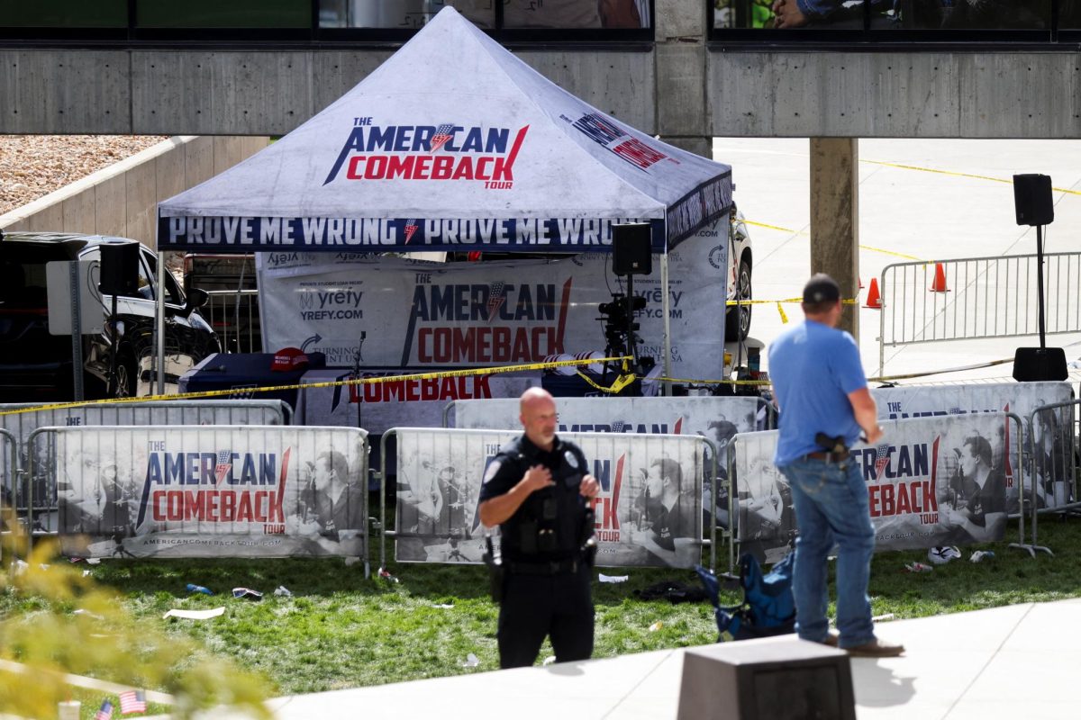 A police officer stands in front of a tent bearing the slogan 'The American Comeback Tour', cordoned off after U.S. right-wing activist, commentator, Charlie Kirk, an ally of U.S. President Donald Trump, was fatally shot during an event at Utah Valley University, in Orem, Utah, U.S. September 10, 2025.  REUTERS/Jim Urquhart