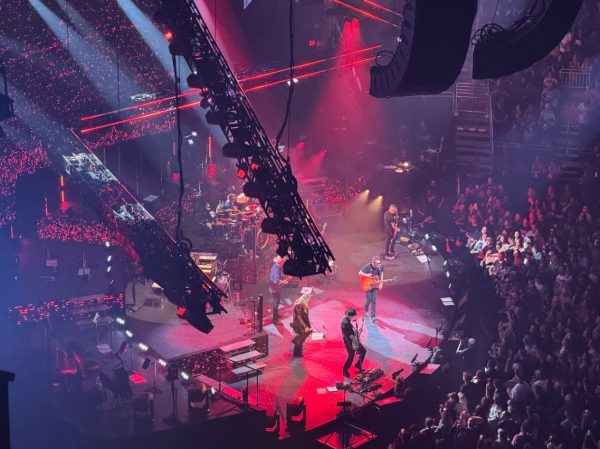 Eric Church performs with his band at PPG Paints Arena.