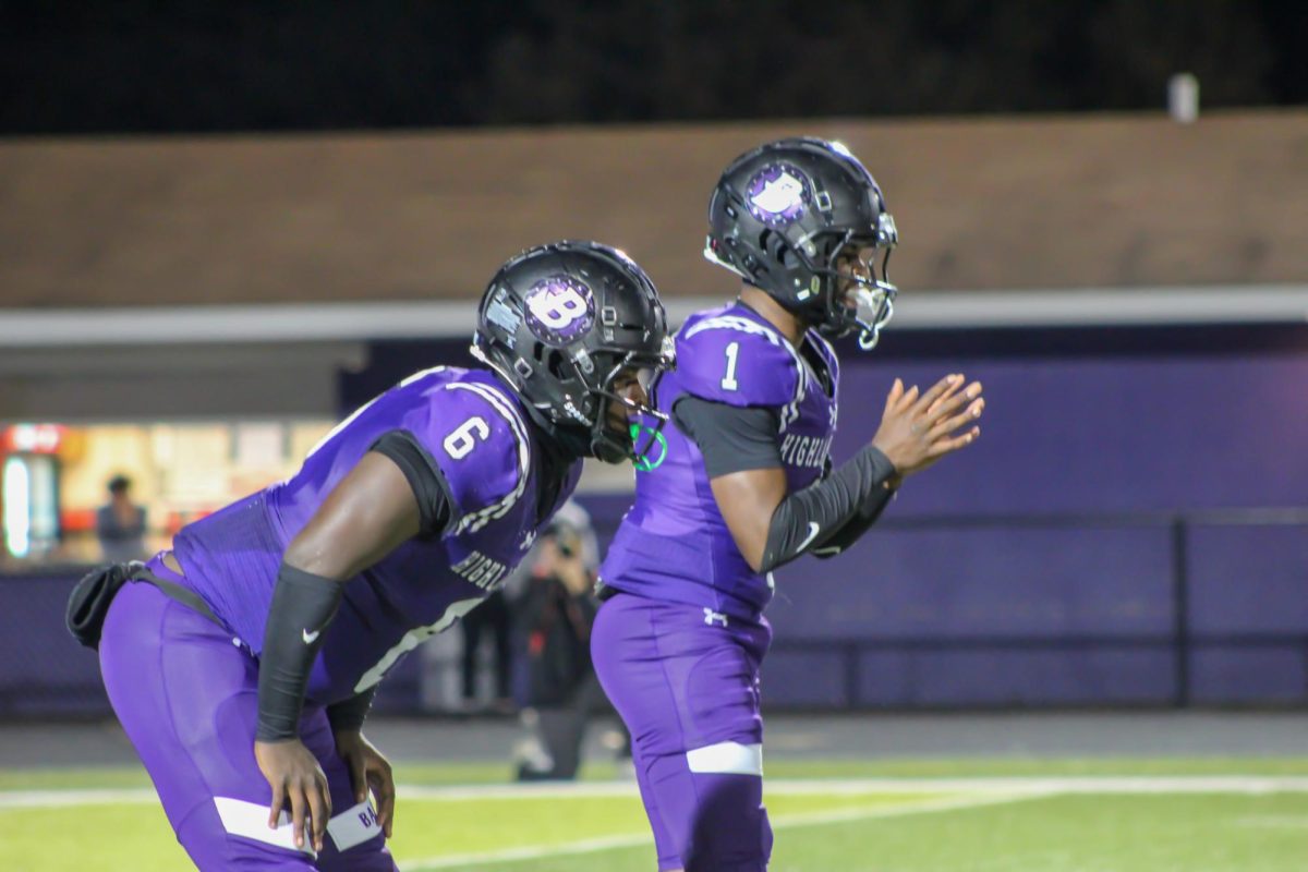 Juniors Dre'On Fuller and Jourdan Bryant get set before the snap.