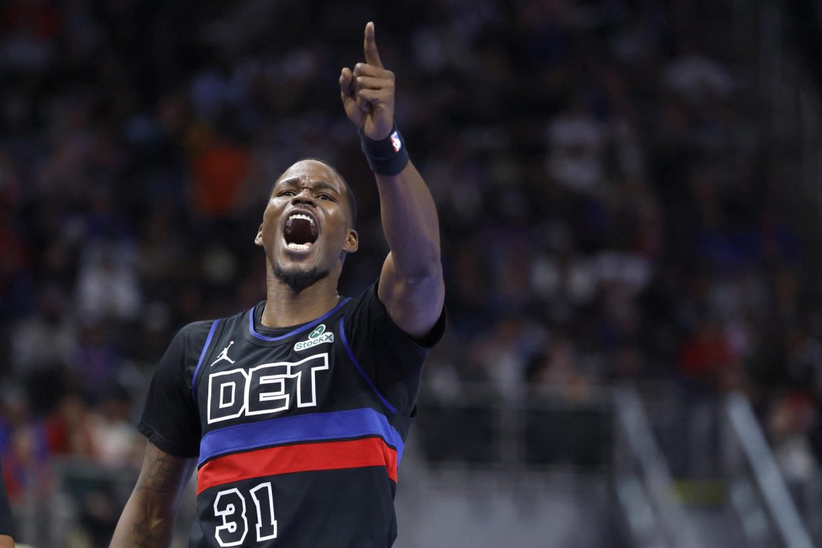 Nov 14, 2025; Detroit, Michigan, USA;  Detroit Pistons guard Javonte Green (31) celebrates in the second half against the Philadelphia 76ers at Little Caesars Arena. Rick Osentoski-Imagn Images