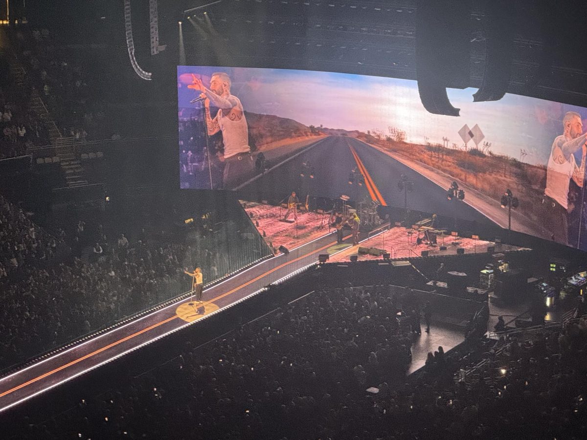 Adam Levine, lead singer of Maroon 5, performs “Maps” during the group’s concert at PPG Paints Arena. 