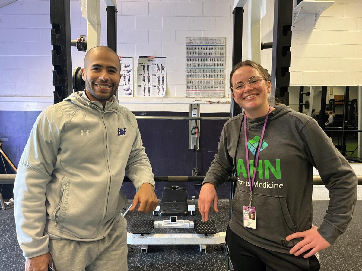 Jeremy McCullough, Baldwin Assistant Athletic Director, and Natalie Sorce, Baldwin Athletic Trainer, work with athletes to prevent injuries. 