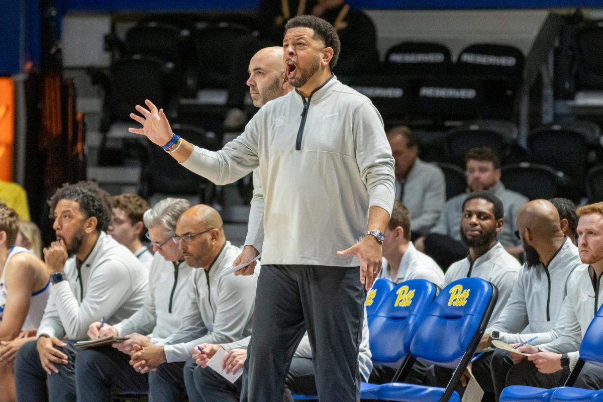 Pitt Coach Jeff Capel communicates with the team against Hofstra.