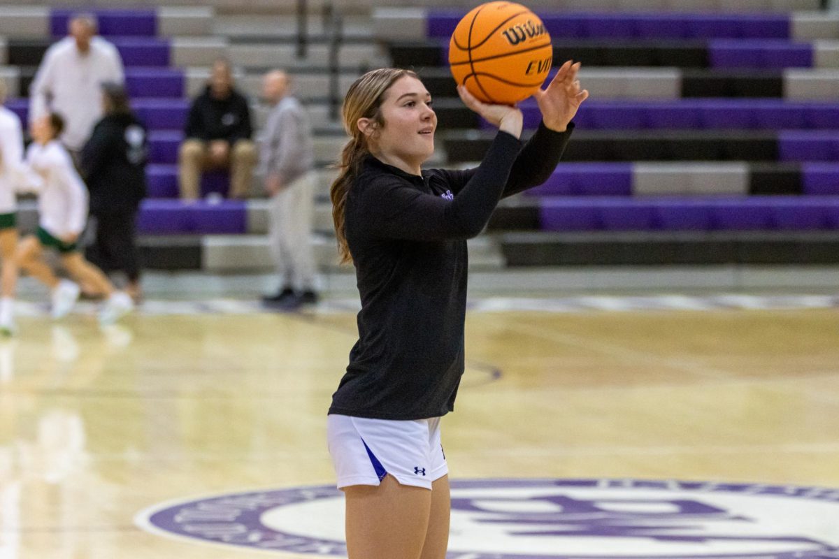 Junior Kelsey Meyer shoots a three-pointer during warmups against Penn-Trafford.