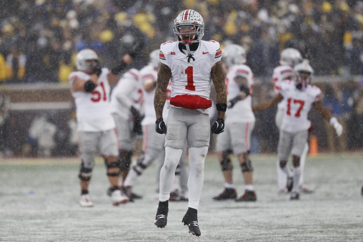 Nov 29, 2025; Ann Arbor, Michigan, USA;  Ohio State Buckeyes wide receiver Brandon Inniss (1) celebrates in the second half against the Michigan Wolverines at Michigan Stadium. Mandatory Credit: Rick Osentoski-Imagn Images