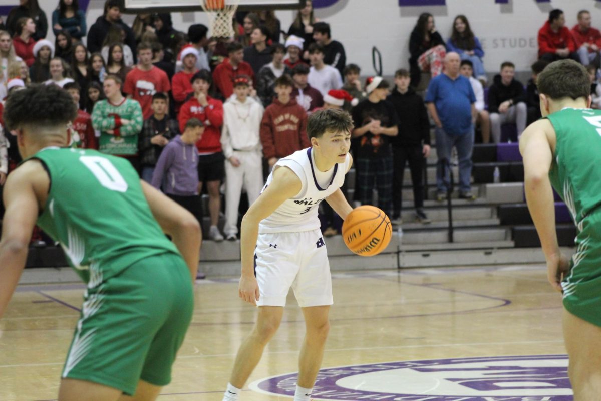 Junior Evan Golvash dribbles the ball as he enters the offensive zone. 