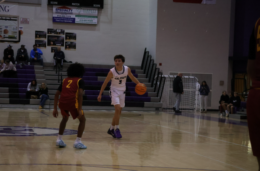Junior Evan Golvash takes the ball up the court for Baldwin. 