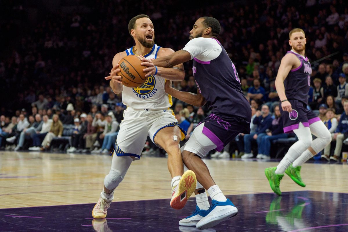 Jan 25, 2026; Minneapolis, Minnesota, USA; Golden State Warriors guard Stephen Curry (30) is fouled by Minnesota Timberwolves guard Mike Conley (10) in the fourth quarter at Target Center. Mandatory Credit: Matt Blewett-Imagn Images