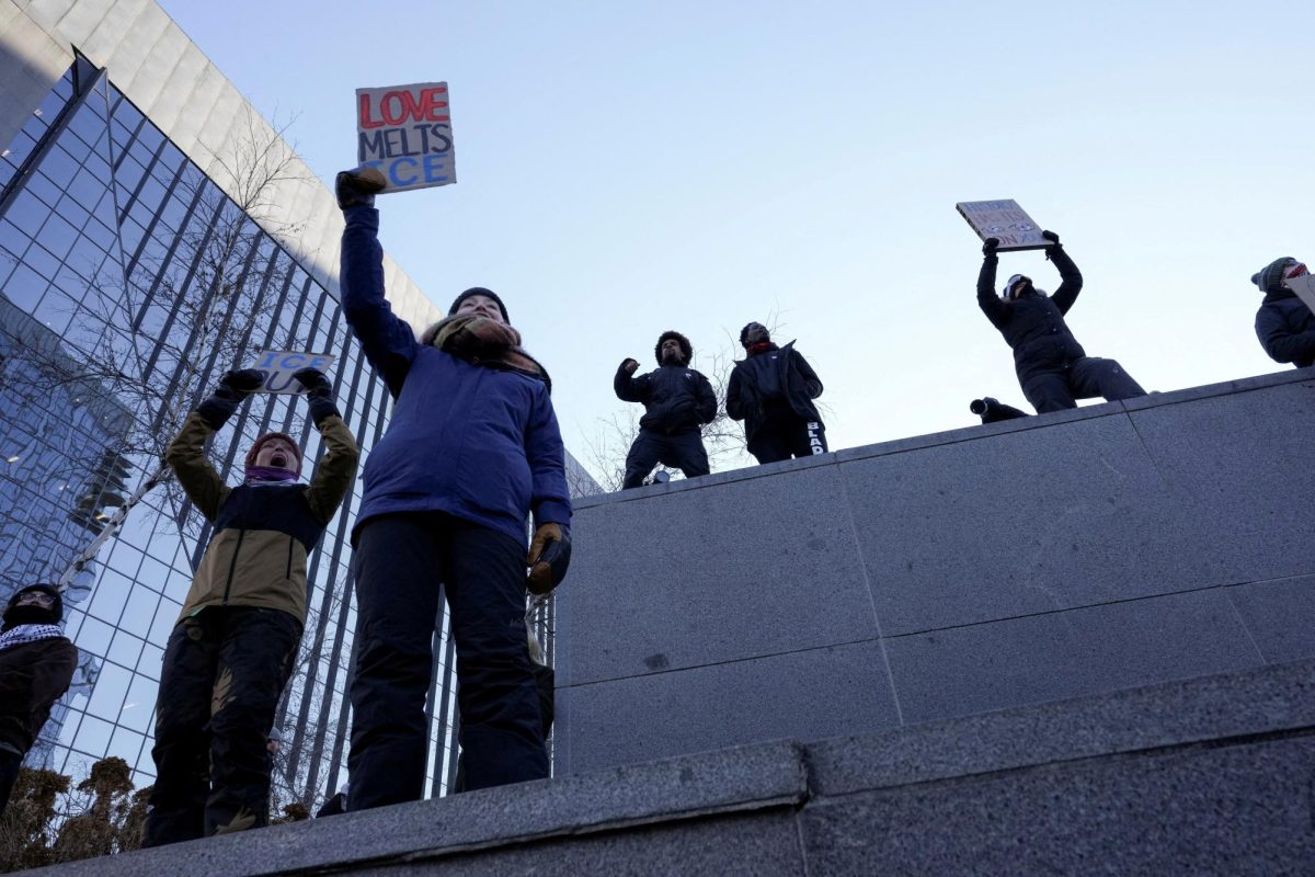 Demonstrators attend an "ICE Out" protest, after the fatal shootings of Renee Nicole Good and Alex Pretti by U.S. federal immigration agents, in Minneapolis, Minnesota, U.S., January 30, 2026. REUTERS/Tim Evans