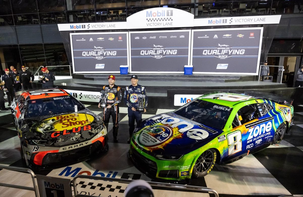 Feb 11, 2026; Daytona Beach, Florida, USA; NASCAR Cup Series driver Kyle Busch (8) and Chase Briscoe (19) celebrate after securing the front row during qualifying for the Daytona 500 at Daytona International Speedway. Mandatory Credit: Mark J. Rebilas-Imagn Images