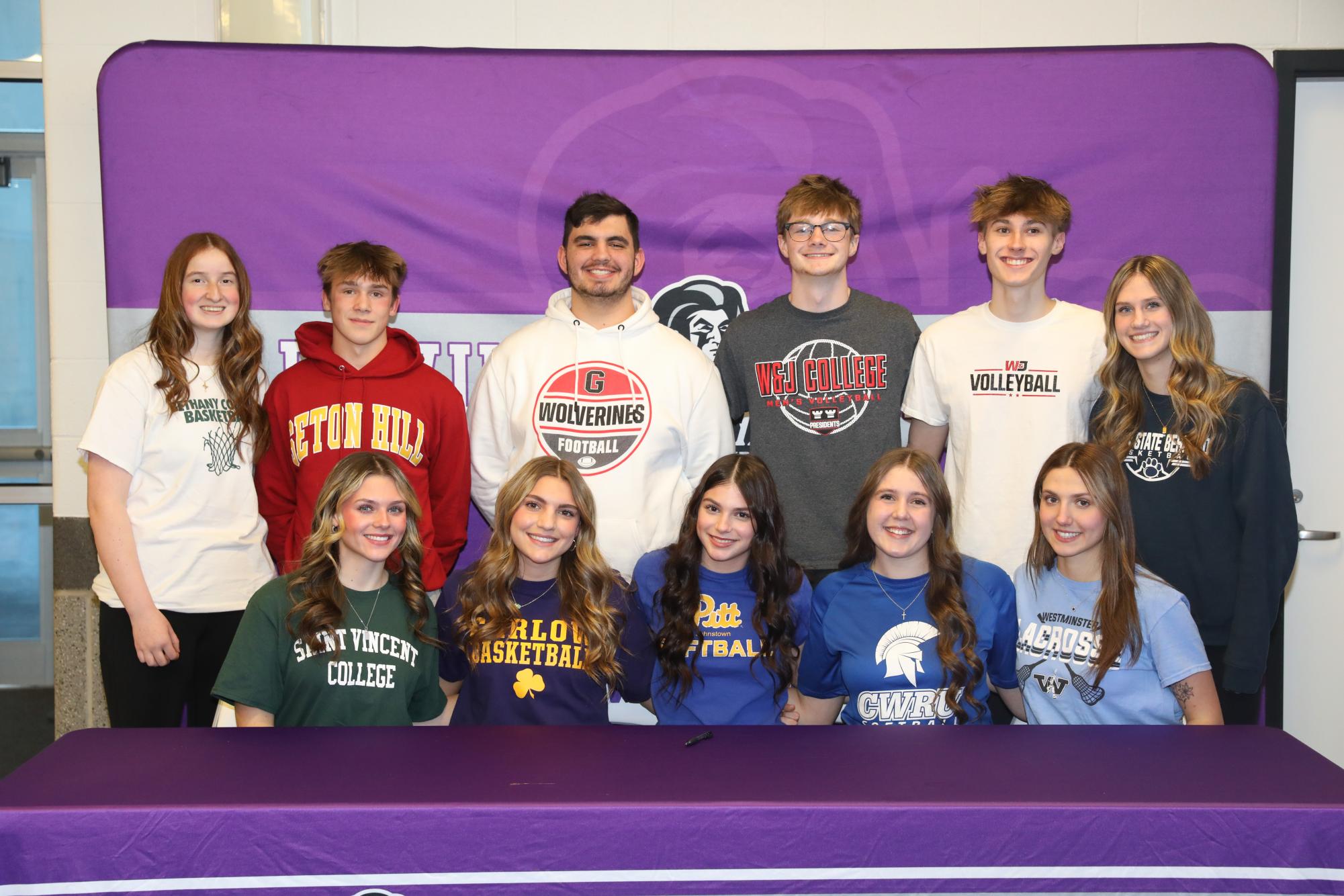 BHS seniors sign their letters of intent to continue their academic and athletic careers. Photo via Baldwin Athletics.