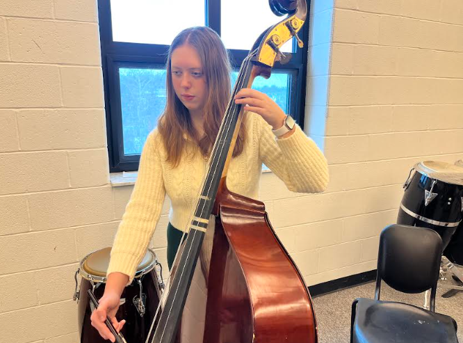 Junior Lucy Smodic enjoys playing multiple instruments and enjoys other activities in her free time, such as reading.