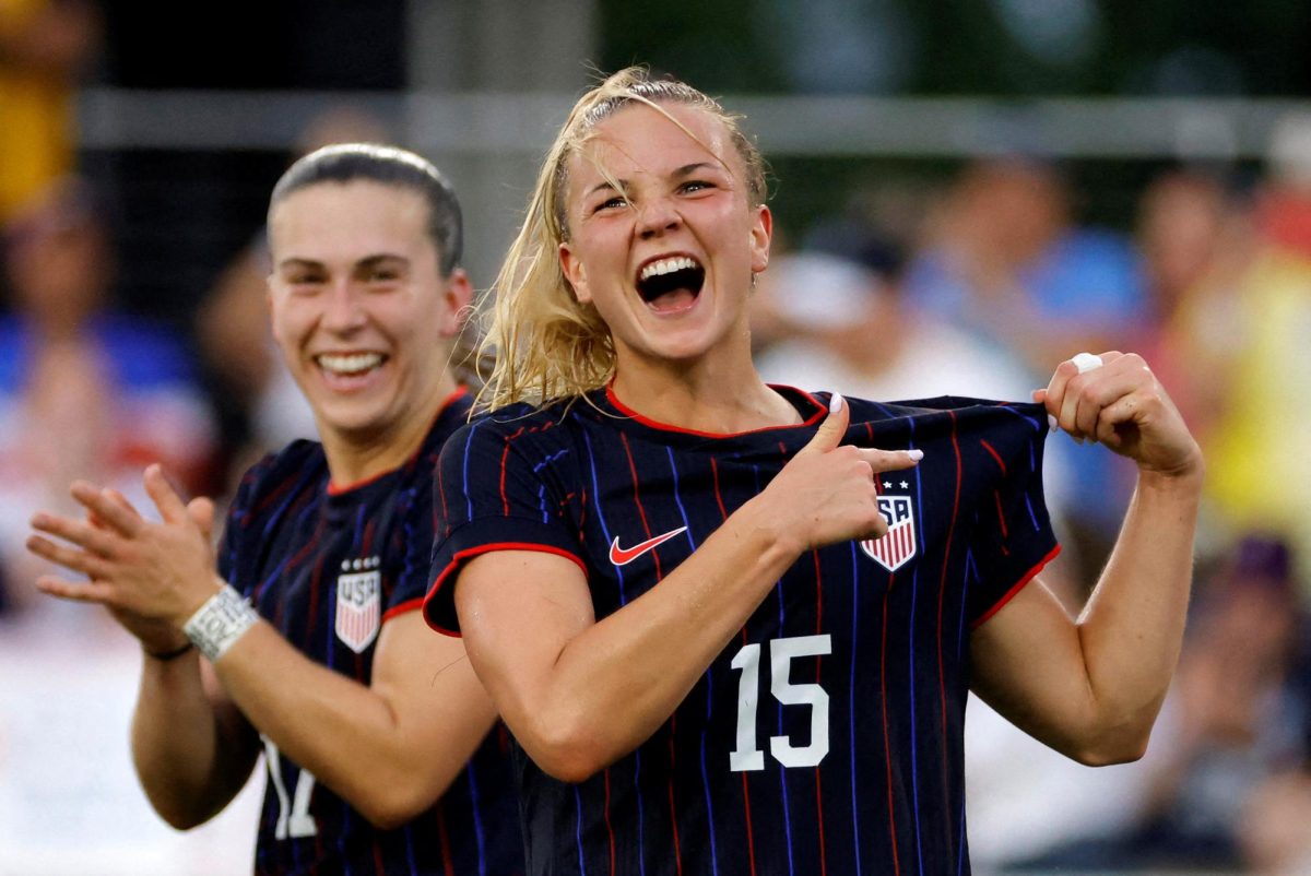 Jul 2, 2025; Washington, District of Columbia, USA; USA midfielder Claire Hutton (15) celebrates after scoring her first international goal against Canada during the first half at Audi Field. Mandatory Credit: Amber Searls-Imagn Images