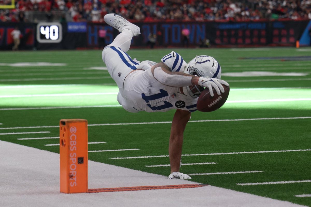 Jan 4, 2026; Houston, Texas, USA;  Indianapolis Colts wide receiver Michael Pittman Jr. (11) makes the catch and dives short of the end zone Houston Texans during the second half at NRG Stadium. Mandatory Credit: Thomas Shea-Imagn Images