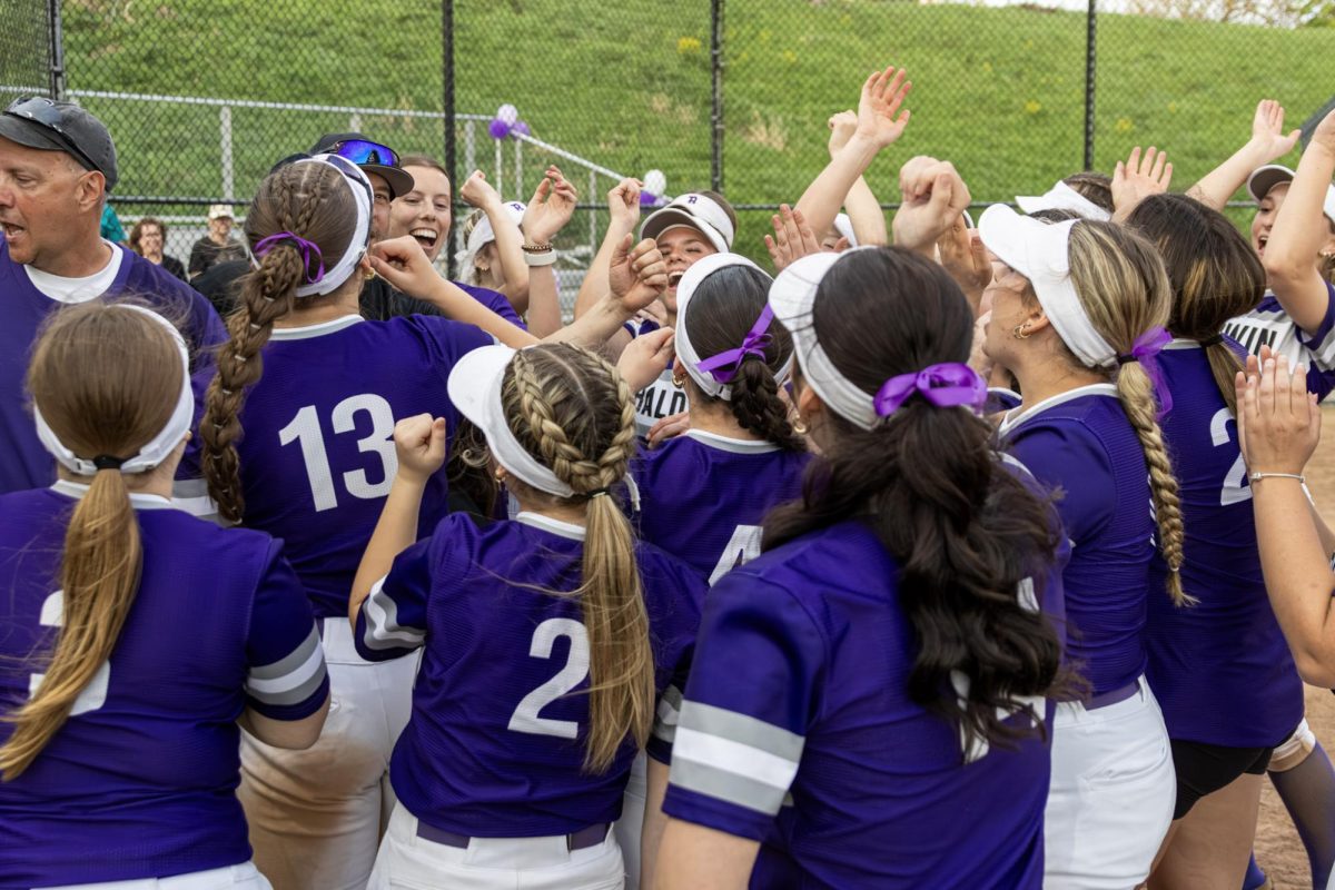The team celebrates after defeating Bethel Park on Baldwin's senior night. 