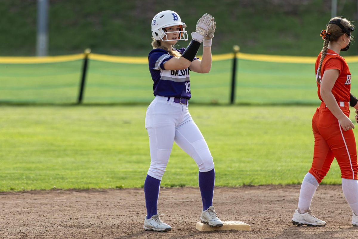 Senior Kenzie Bowen celebrates after getting a hit against Bethel Park. 