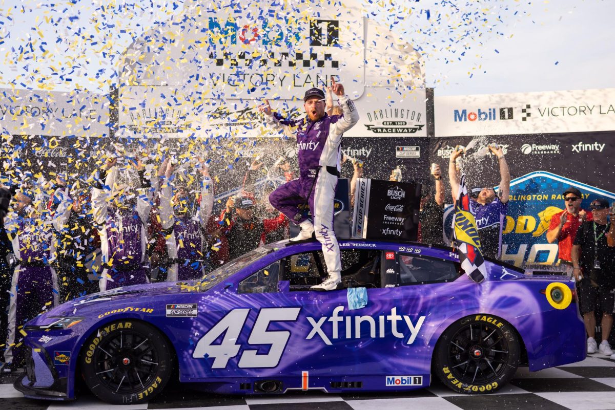 Mar 22, 2026; Darlington, South Carolina, USA; 23XI Racing Tyler Reddick (45) celebrates in Victory Lane after winning at Darlington Raceway. Mandatory Credit: Scott Kinser-Imagn Images