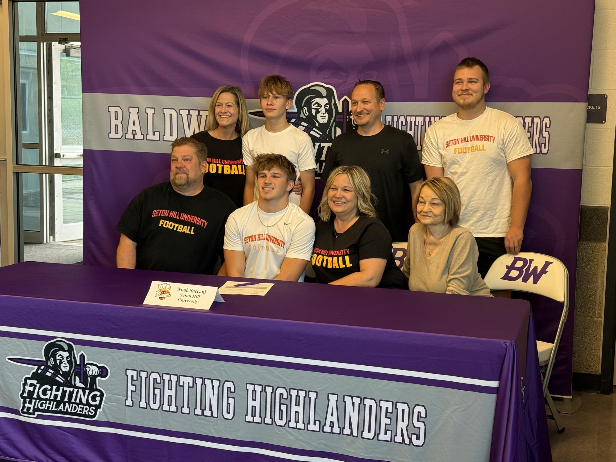 Senior Noah Saccani signs to play football at Seton Hill University.