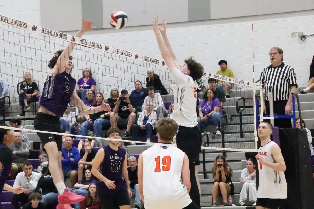 Senior Austin Kruszeweski hits the ball for Baldwin against Bethel Park on senior night. 