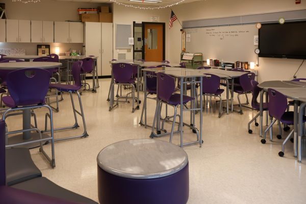 There are high tables, low tables, couches, and other options for students to choose from in teacher Caitlin Dee's classroom.